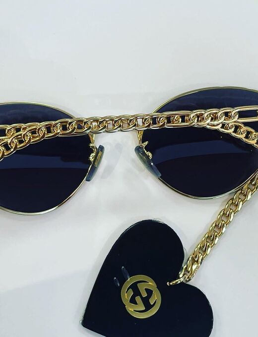 Gucci sunglasses with gold chain