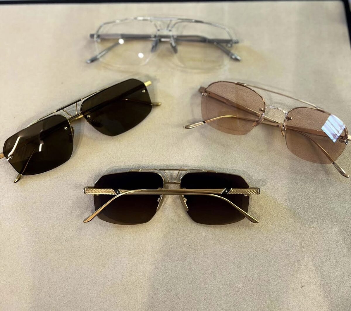 Three pairs of designer sunglasses